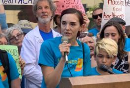 Woman speaking at rally Woman speaking at rally